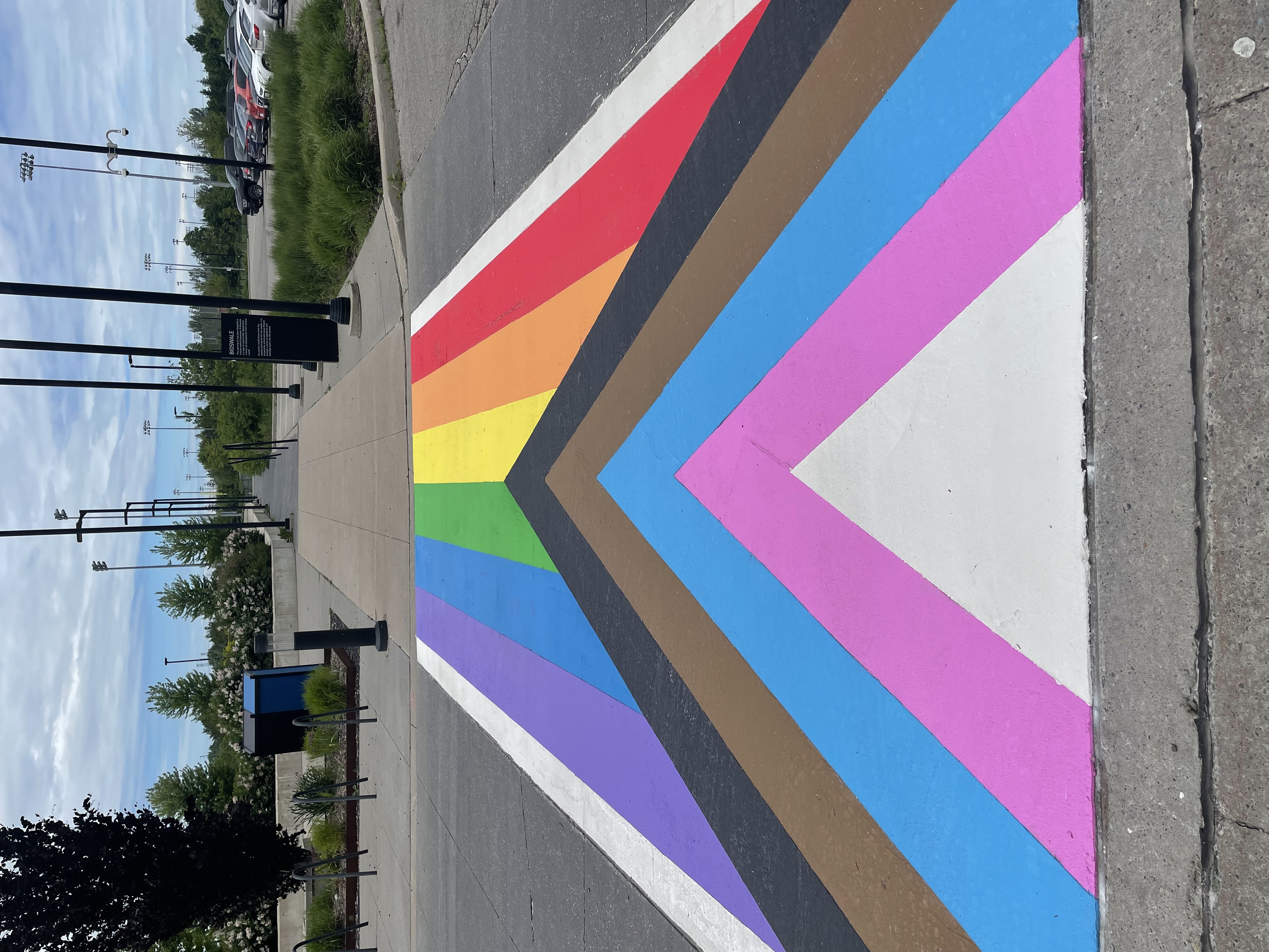 Town of Ajax Progressive Rainbow Flag Crosswalk at Audley Recreation Centre. 